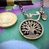 21st birthday gift idea handmade and ethically recycled tree of life necklace pendant made in England from a upcycled pound coin 2005