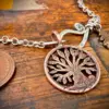handmade and upcycled Strawberry Moon tree of life coin necklace pendant made from a British 1976 half penny perfect 50th special birthday gift idea
