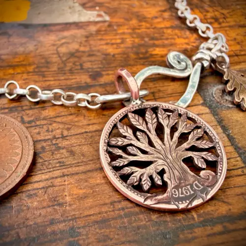 handmade and upcycled Strawberry Moon tree of life coin necklace pendant made from a British 1976 half penny perfect 50th special birthday gift idea
