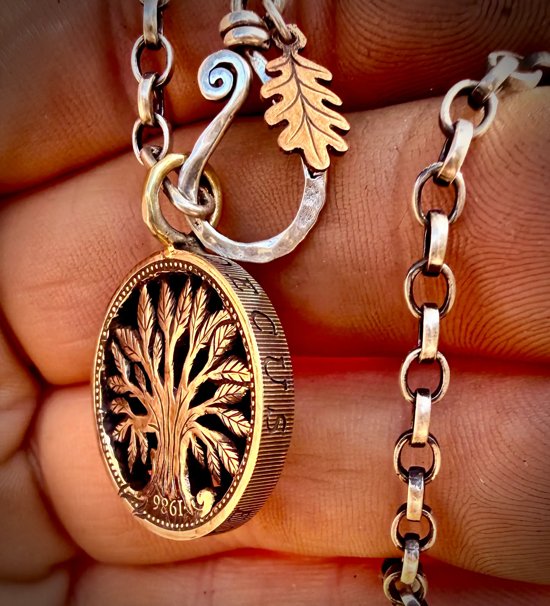 40th birthday gift idea handmade and ethically recycled tree of life necklace pendant made in England from a upcycled pound coin