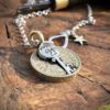 21st birthday gift idea handmade and ethically recycled key necklace pendant made in England from a upcycled pound coin 2002