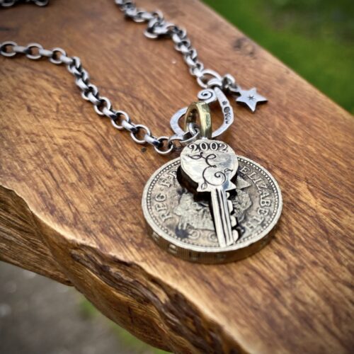 21st birthday gift idea handmade and ethically recycled key necklace pendant made in England from a upcycled pound coin 2002