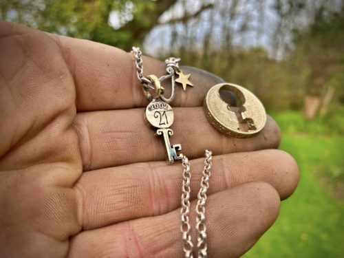 21st birthday gift idea handmade and ethically recycled key necklace pendant made in England from a upcycled pound coin 2002