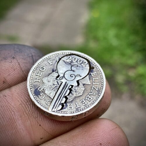 21st birthday gift idea handmade and ethically recycled key necklace pendant made in England from a upcycled pound coin 2002