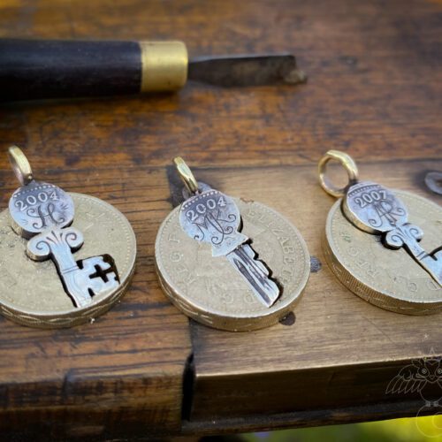 21st birthday gift idea handmade and ethically recycled key necklace pendant made in England from a upcycled pound coin 2004