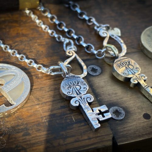 18th birthday gift idea handmade and ethically recycled key necklace pendant made in England from a upcycled pound coin 2007