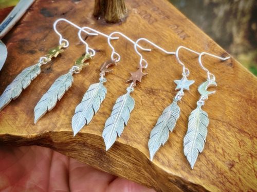 handcrafted and original silver feather earrings made with ethical considerations and materials