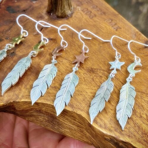 handcrafted and original silver feather earrings made with ethical considerations and materials