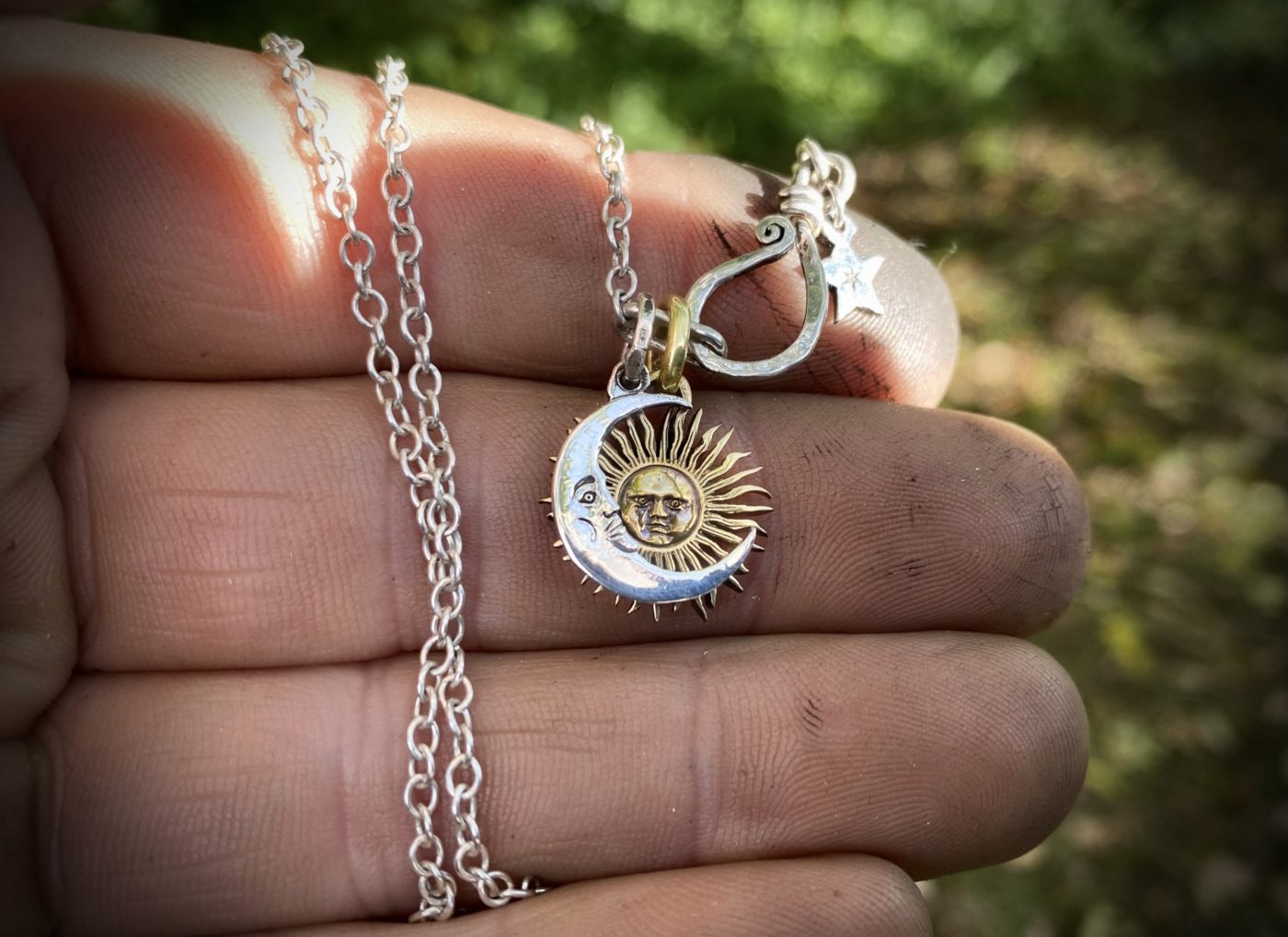 sun and moon jewellery made from old coins unique to hairy growler