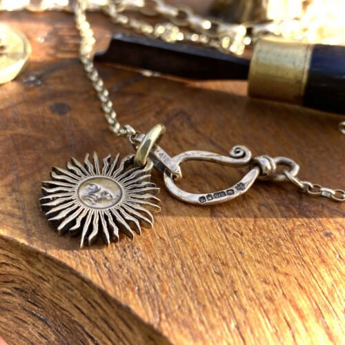 sun and moon jewellery made from old coins unique to hairy growler