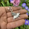Handcrafted and recycled sterling silver flying-pig necklace