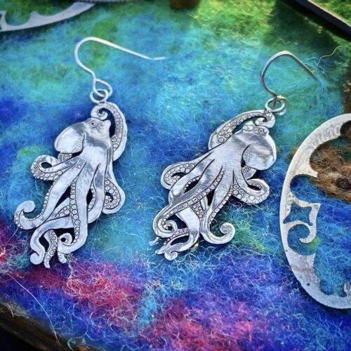 Kraken earrings made from 100 year old silver shilling coins, unique original enchanting underwater love jewellery.