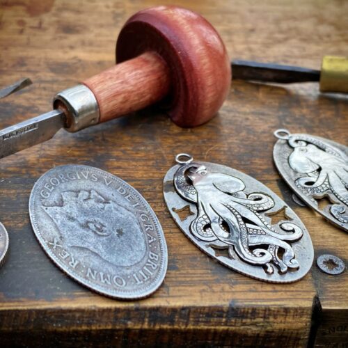 Kraken earrings made from 100 year old silver shilling coins, unique original enchanting underwater love jewellery.