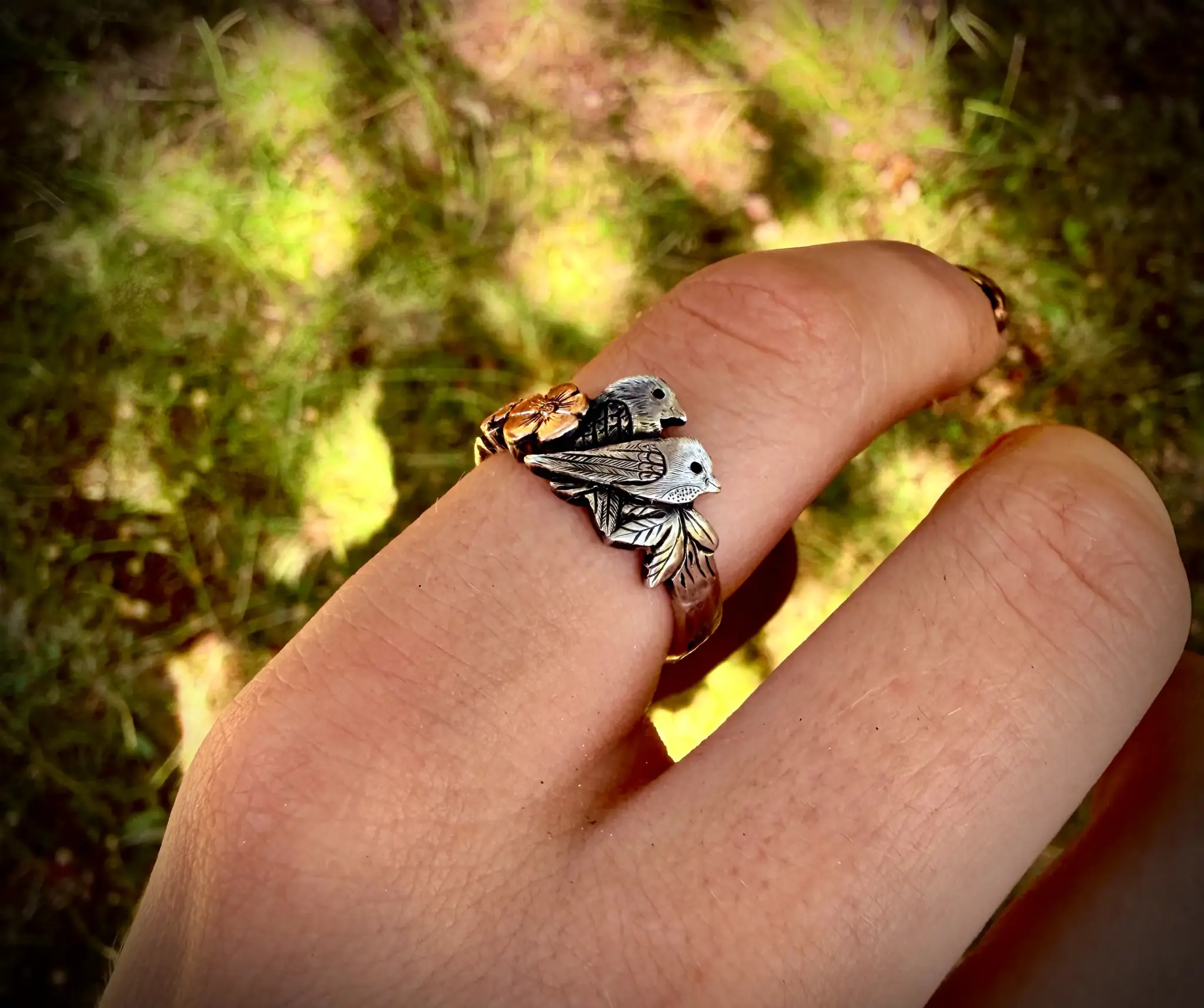 Birdsong ring meticulously hand crafted from a silver half crown coin using traditional hand tools