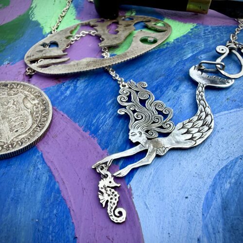handmade and recycled silver mermaid necklace complete with seahorse.