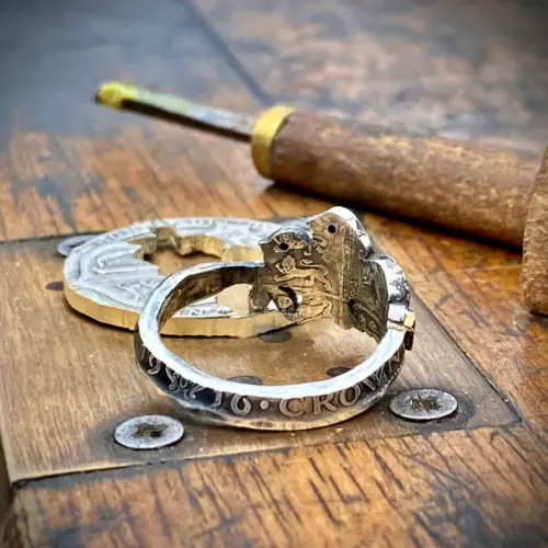 Birdsong ring meticulously hand crafted from a silver half crown coin using traditional hand tools