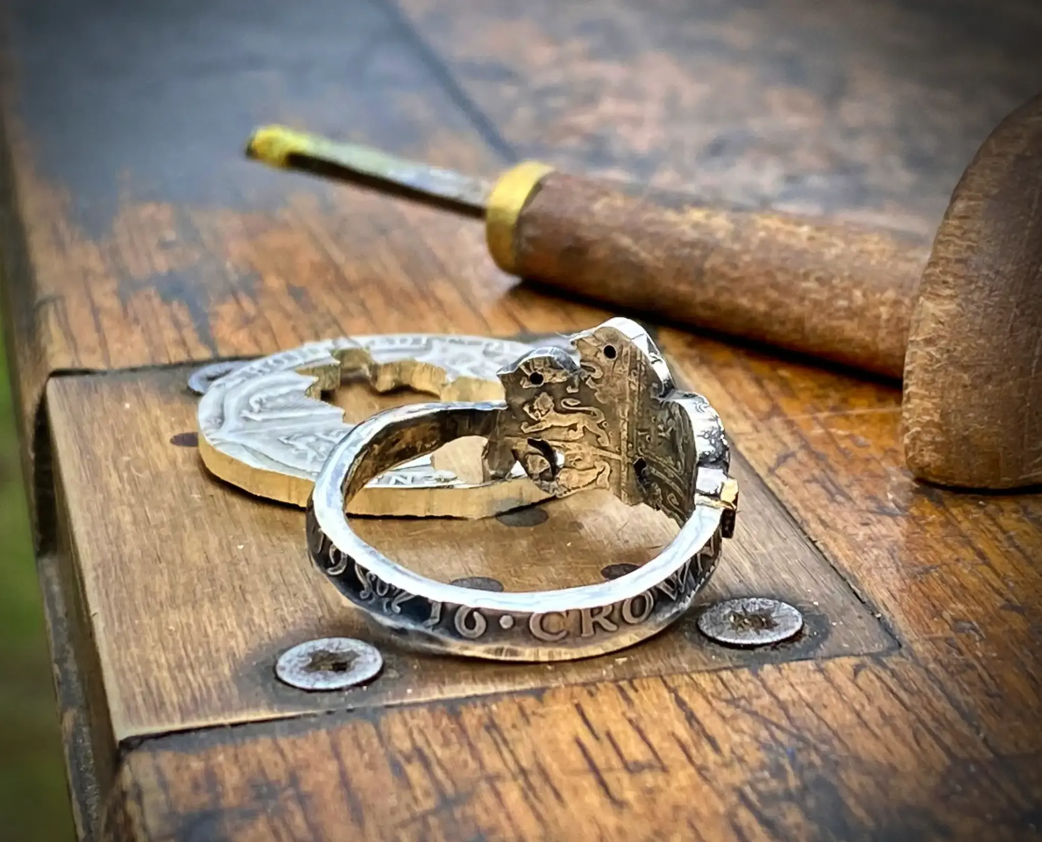 Birdsong ring meticulously hand crafted from a silver half crown coin using traditional hand tools