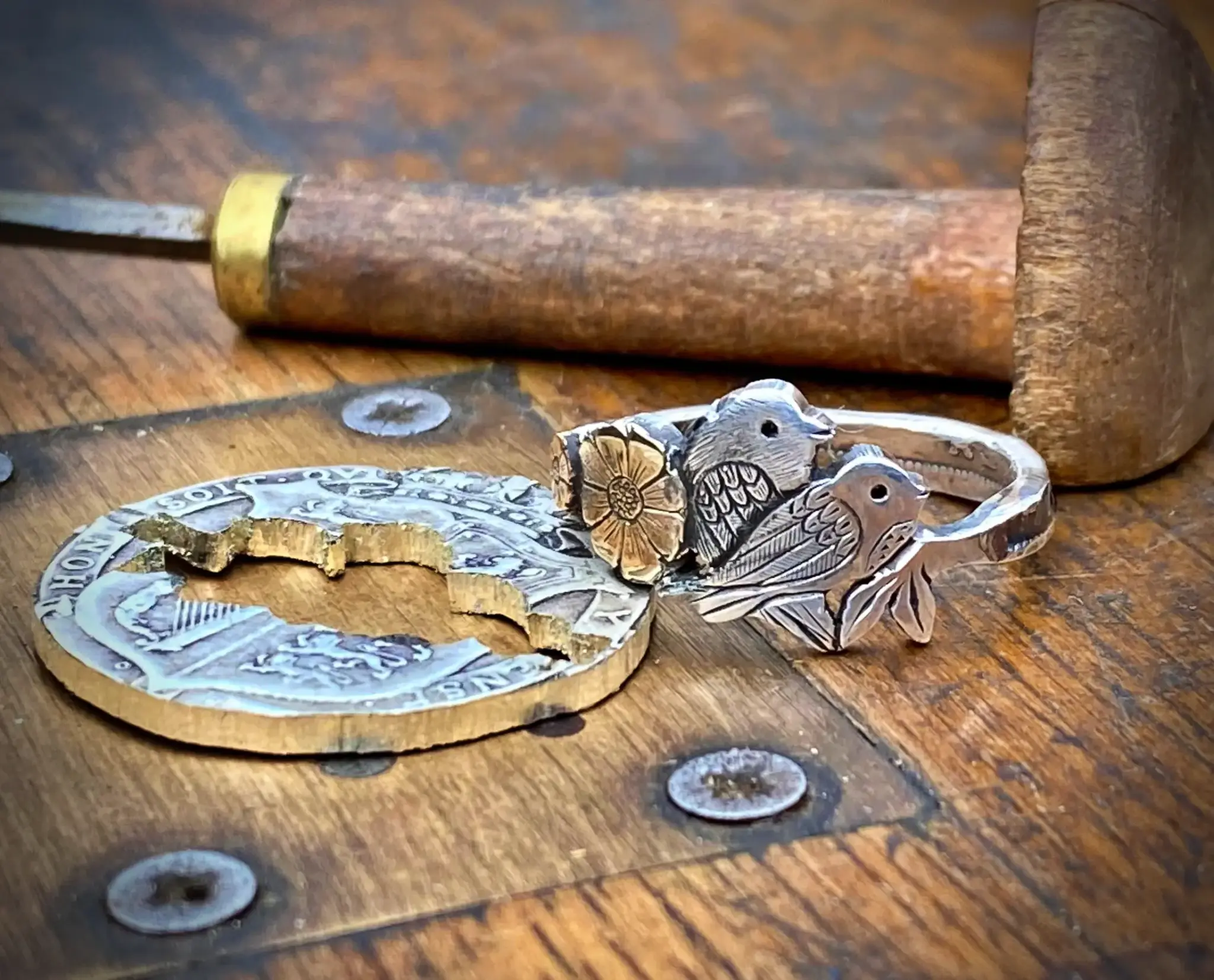 Birdsong ring meticulously hand crafted from a silver half crown coin using traditional hand tools