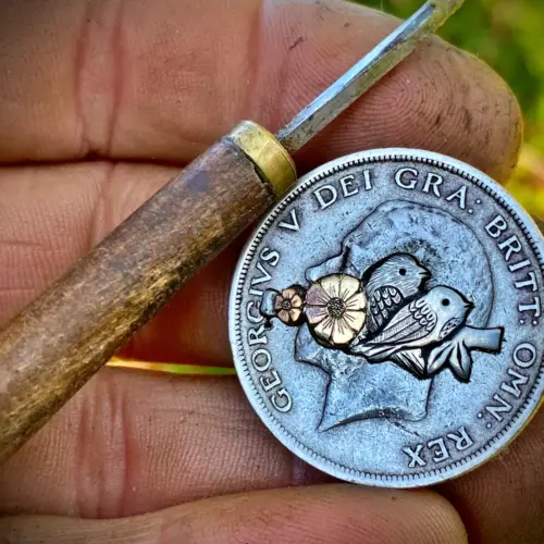 Birdsong ring meticulously hand crafted from a silver half crown coin using traditional hand tools