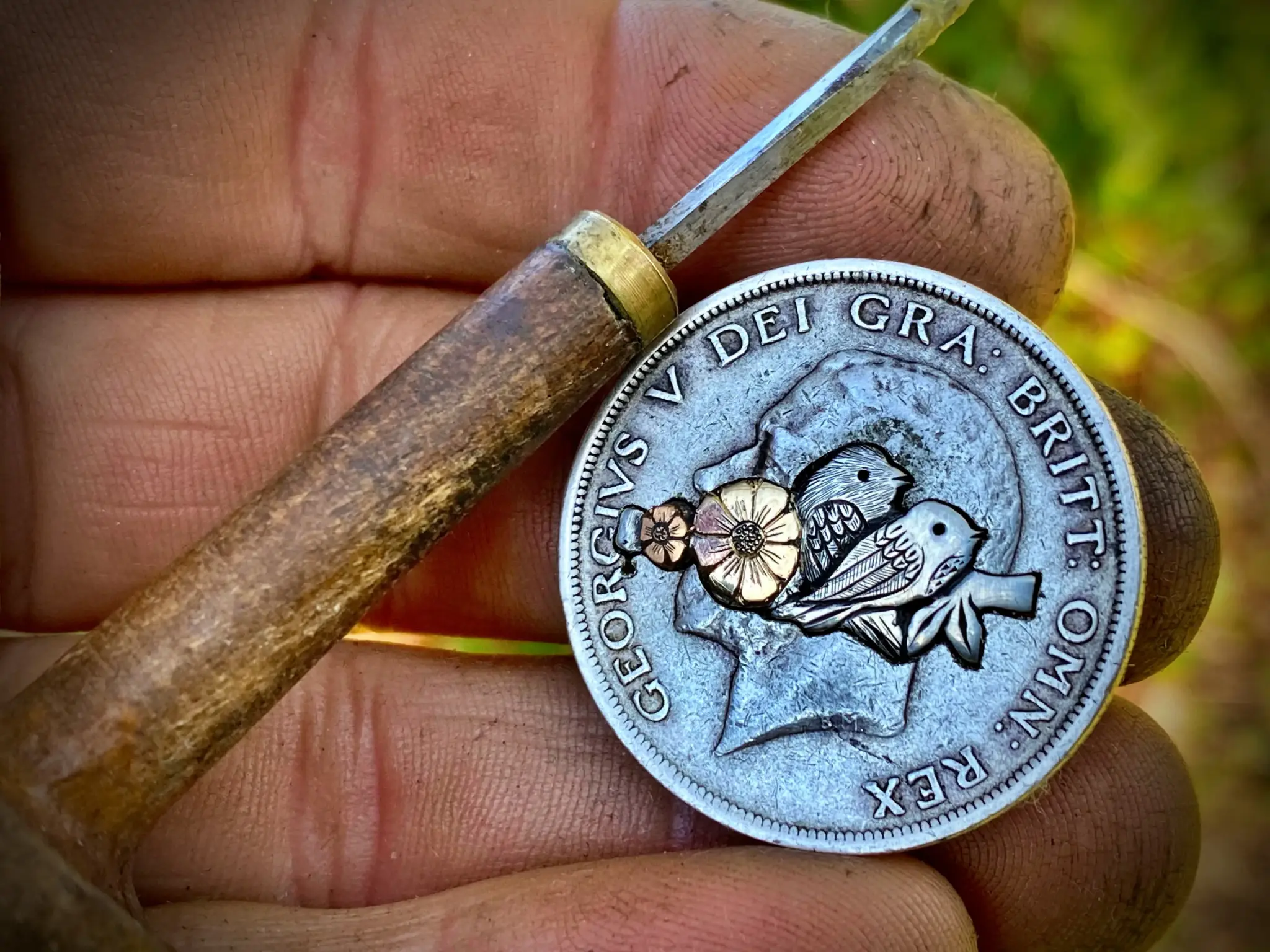Birdsong ring meticulously hand crafted from a silver half crown coin using traditional hand tools