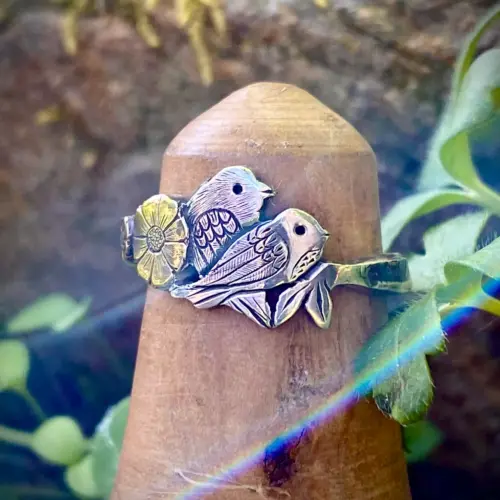 Birdsong ring meticulously hand crafted from a silver half crown coin using traditional hand tools