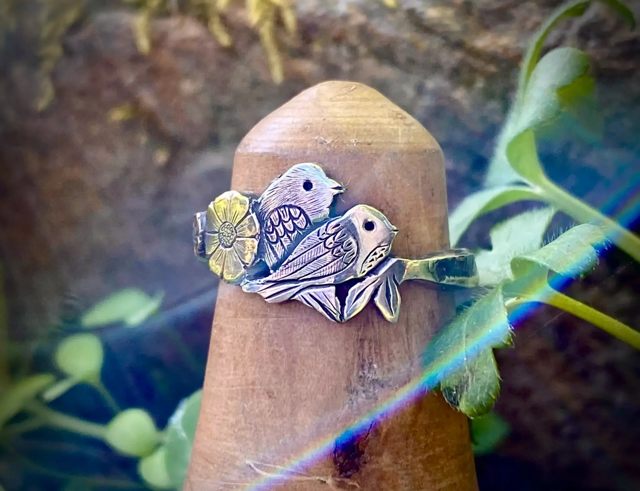 Birdsong ring meticulously hand crafted from a silver half crown coin using traditional hand tools