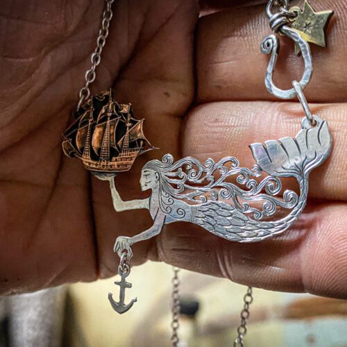 handmade and recycled silver mermaid necklace complete with seahorse and golden hind ship