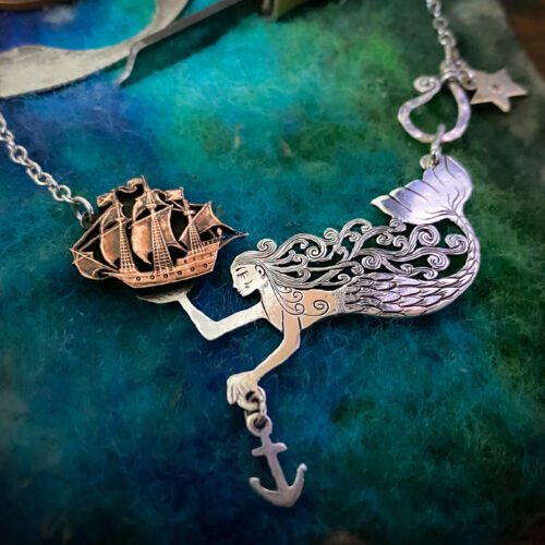 handmade and recycled silver mermaid necklace complete with seahorse and golden hind ship