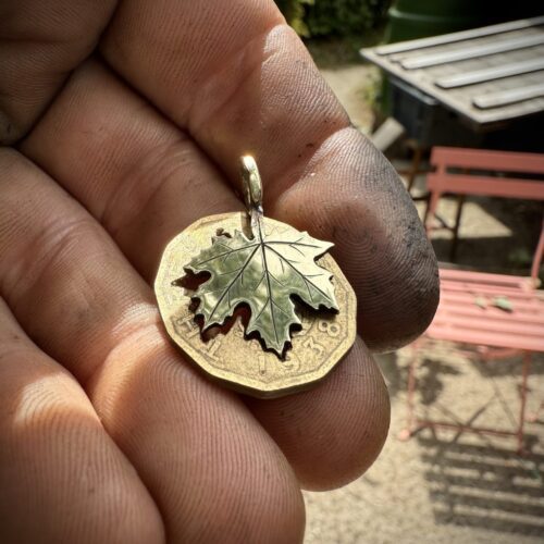 Maple leaf necklace ethical jewellery made from recycled silver coins.
