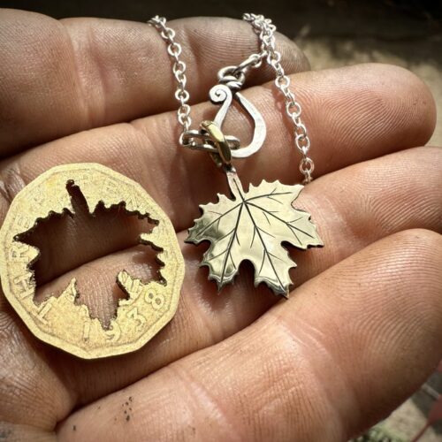 Maple leaf necklace ethical jewellery made from recycled silver coins.