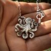 Handmade and upcycled, recycled silver coin kraken octopus necklace made in landlocked Cambridge, UK