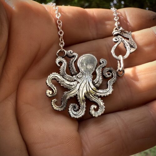 Handmade and upcycled, recycled silver coin kraken octopus necklace made in landlocked Cambridge, UK