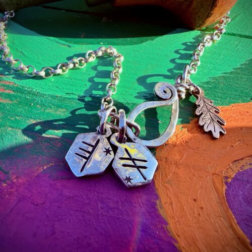 Ogham rune charms holly and Ivy