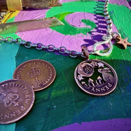 handmade and upcycled Strawberry Moon gazer bunny hare coin necklace pendant made from a British half penny perfect 40th or 50th special birthday gift idea