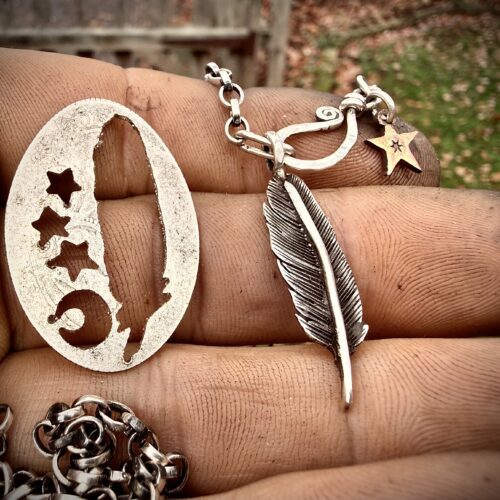 Feather ethical jewellery handmade and recycled silver feather necklace