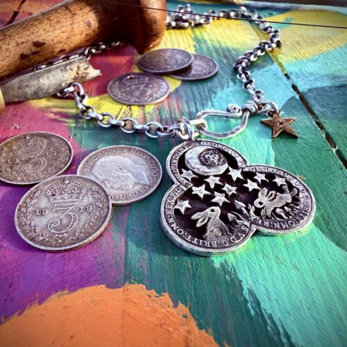 Moon Gazing and leaping hare necklace pendant handcrafted and recycled from six silver sixpence coins all over 100 years old