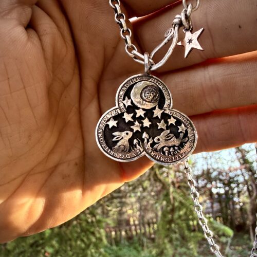 Moon Gazing and leaping hare necklace pendant handcrafted and recycled from six silver sixpence coins all over 100 years old