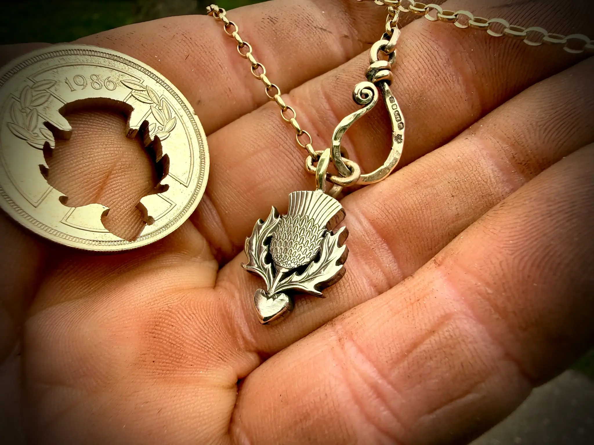 Thistle necklace pendant handmade from an old coin