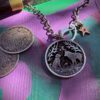 the dimpsey time. A dimply necklace pendant made from upcucled silver shilling coins in Cambridge England