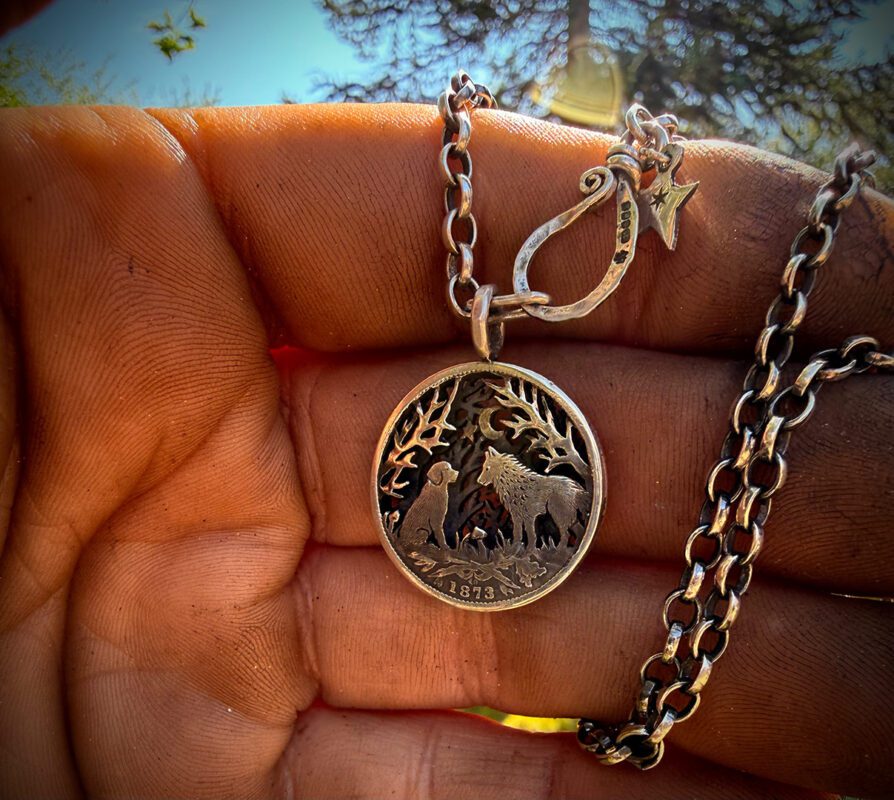 the dimpsey time. A dimply necklace pendant made from upcucled silver shilling coins in Cambridge England