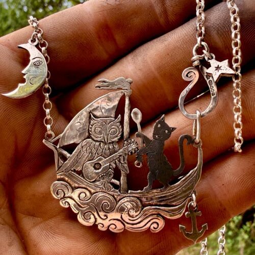 the owl and the pussycat necklace completely handcrafted in Cambridge using only upcycled silver coins of a bygone era
