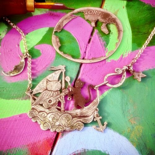 the owl and the pussycat necklace completely handcrafted in Cambridge using only upcycled silver coins of a bygone era