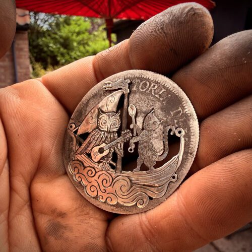 the owl and the pussycat necklace completely handcrafted in Cambridge using only upcycled silver coins of a bygone era