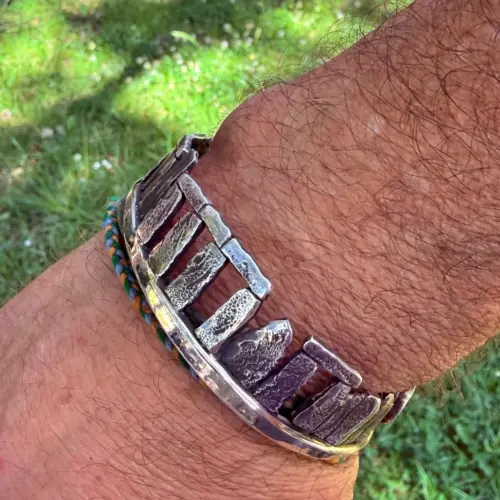 Stonehenge Celestial bracelet cuff a signature work by Hairy Growler, Cambridge. Made in England