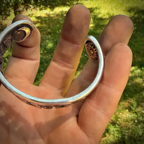 Stonehenge Celestial bracelet cuff a signature work by Hairy Growler, Cambridge. Made in England