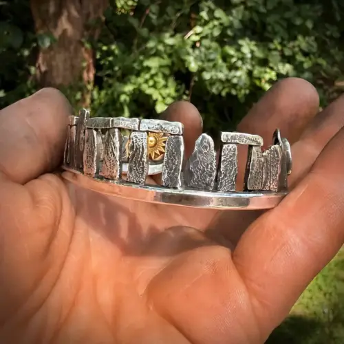 Stonehenge Celestial bracelet cuff a signature work by Hairy Growler, Cambridge. Made in England