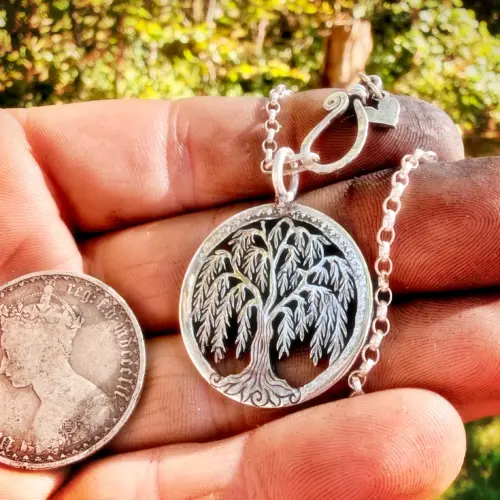 willow tree pendant handmade from a silver coin.