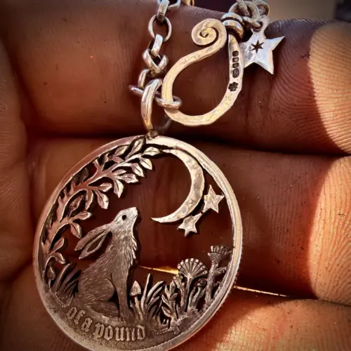 silver coin moon gazing hare necklace pendant made in England