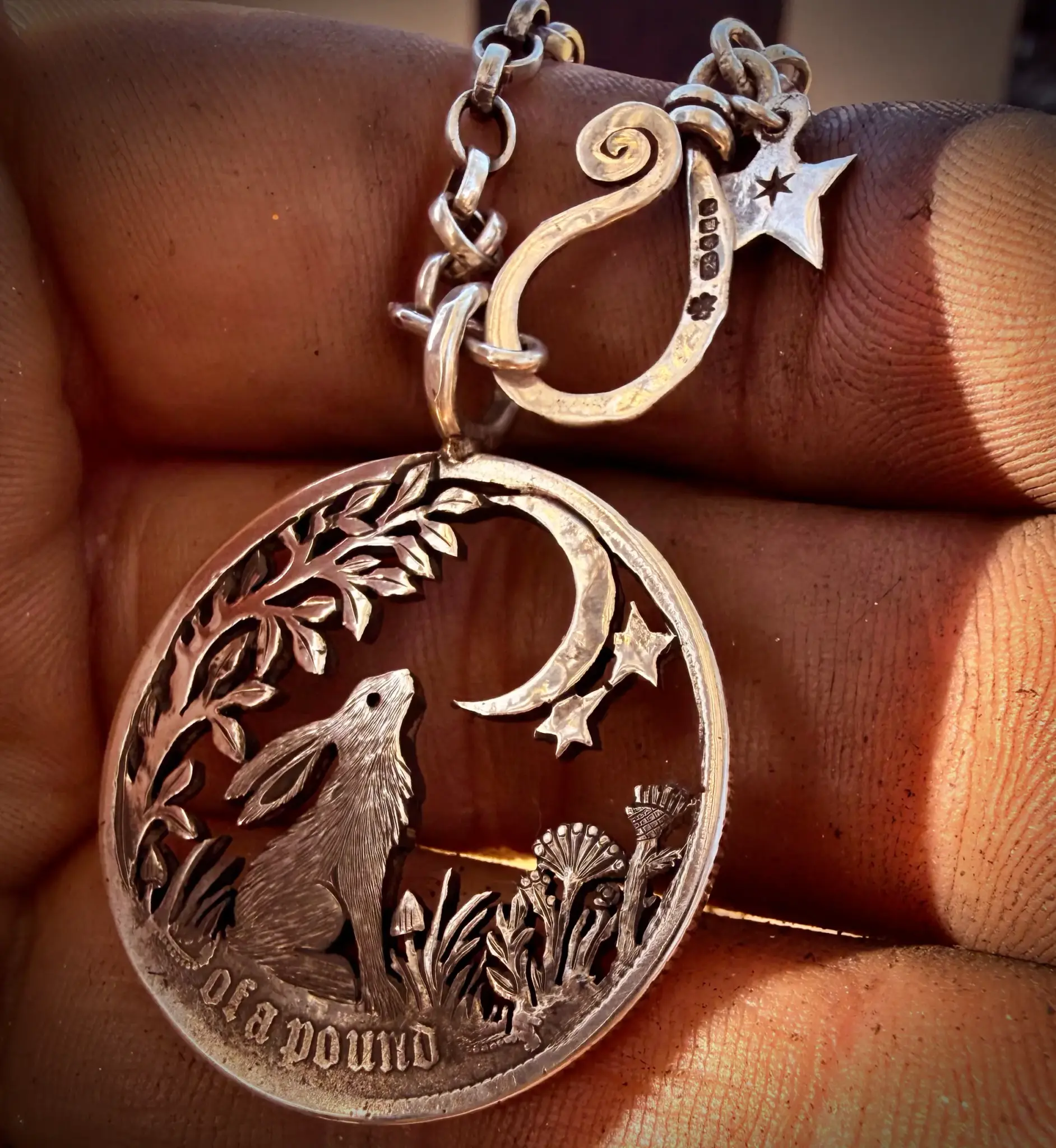 silver coin moon gazing hare necklace pendant made in England
