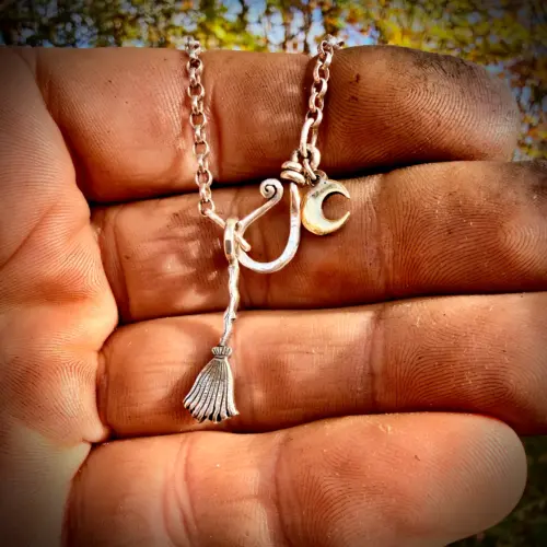 witch's broomstick charm a witches amulet and etc.